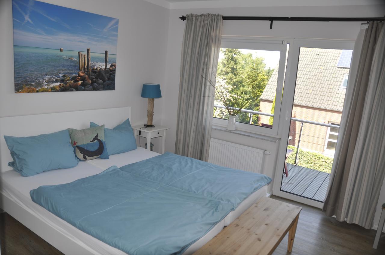 Hotel&Ferienunterkünfte Hus Seeblick Fehmarn Exterior foto