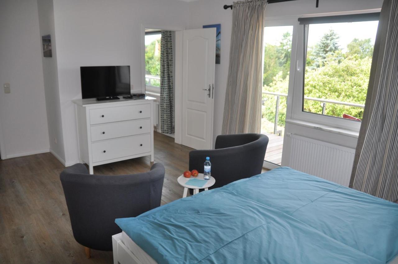 Hotel&Ferienunterkünfte Hus Seeblick Fehmarn Exterior foto
